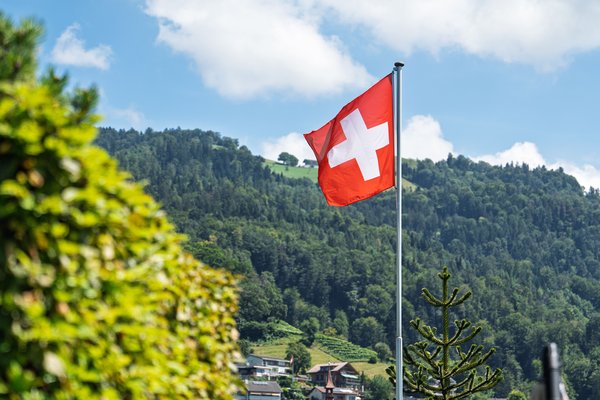 swiss-flag-waving-proudly-against-a-backdrop-of-ve-2026-01-31-22-13-19-utc